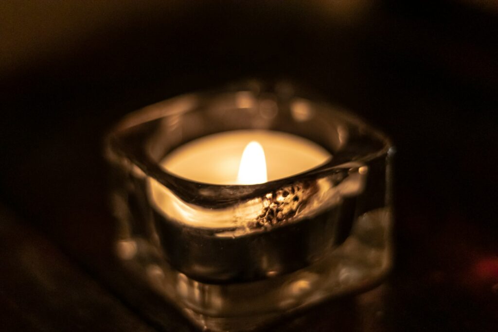 clear glass candle holder close-up photography